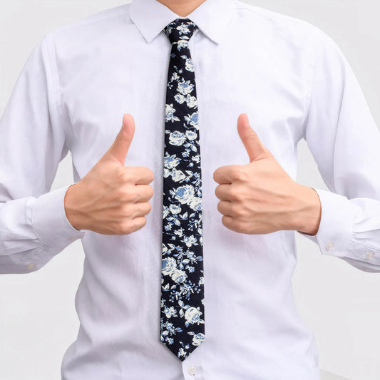 Business man wears HAWSON blue floral skinny tie with slim fit suit