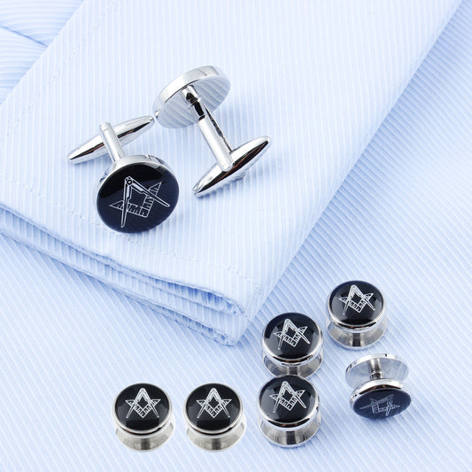  It includes a pair of cufflinks (with the traditional toggle back for securing French cuffs) and matching shirt studs, all styled uniformly for a coordinated, formal look.