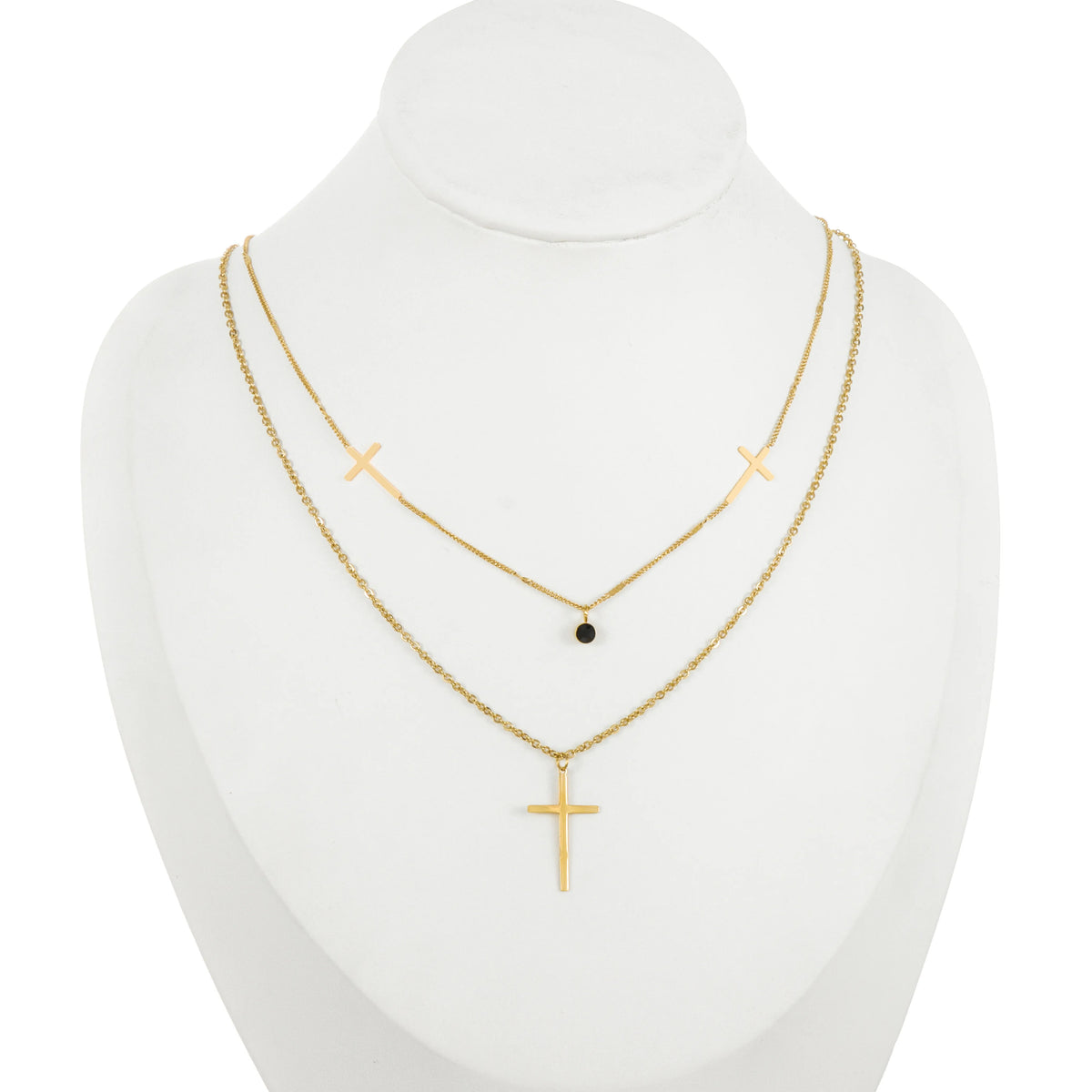 Dainty gold-tone layered necklace sets featuring delicate chains, pendants, and charms. Choose from multiple styles for an effortless stacked look.