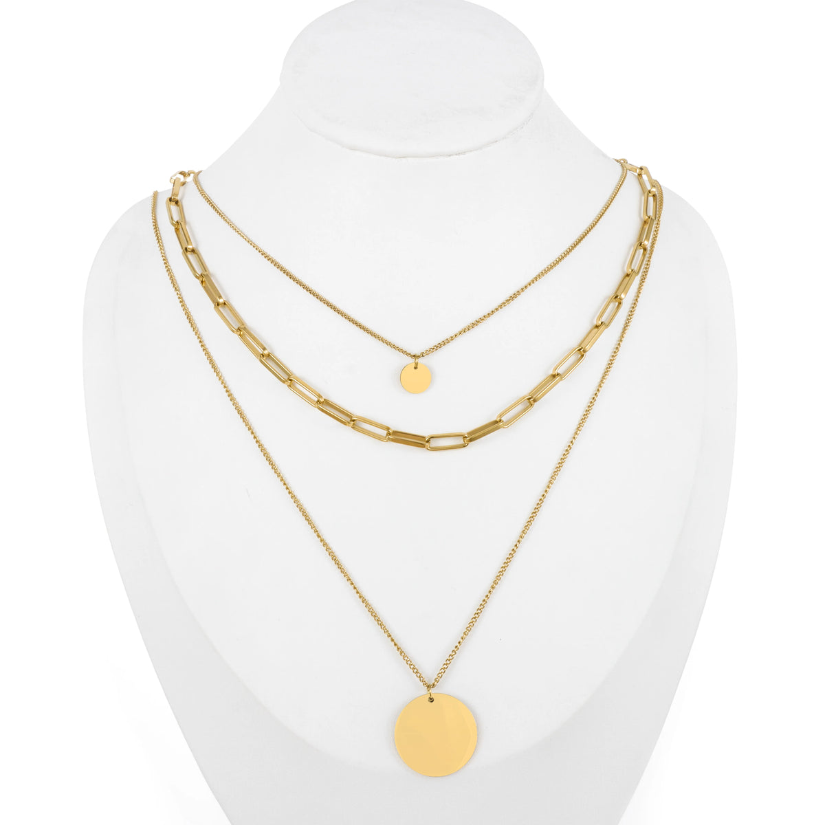 Dainty gold-tone layered necklace sets featuring delicate chains, pendants, and charms. Choose from multiple styles for an effortless stacked look.