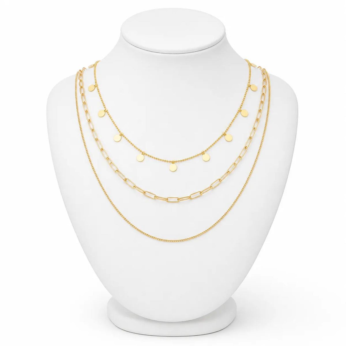 Dainty gold-tone layered necklace sets featuring delicate chains, pendants, and charms. Choose from multiple styles for an effortless stacked look.
