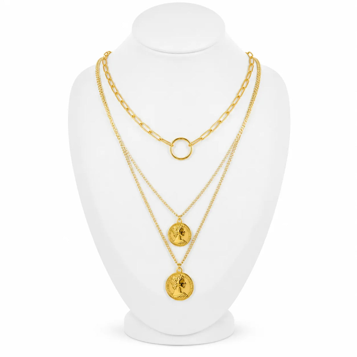 Dainty gold-tone layered necklace sets featuring delicate chains, pendants, and charms. Choose from multiple styles for an effortless stacked look.