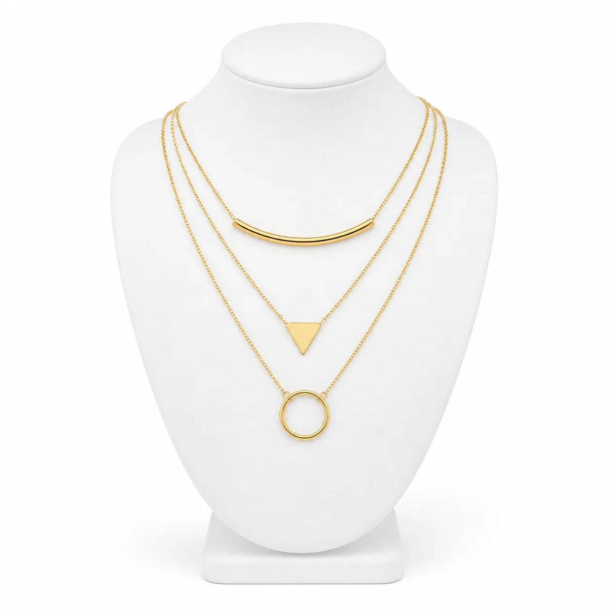Dainty gold-tone layered necklace sets featuring delicate chains, pendants, and charms. Choose from multiple styles for an effortless stacked look.