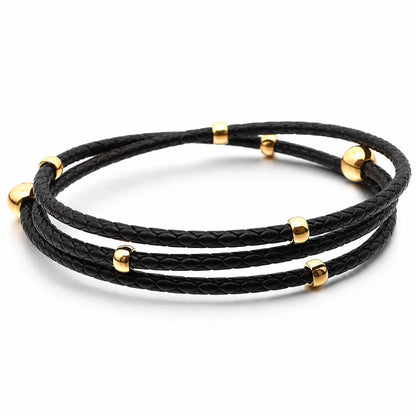 Shop a 6-piece textured braided bracelet set. Mix and match nautical anchor and hook styles in gold and silver tones for versatile wholesale accessories.