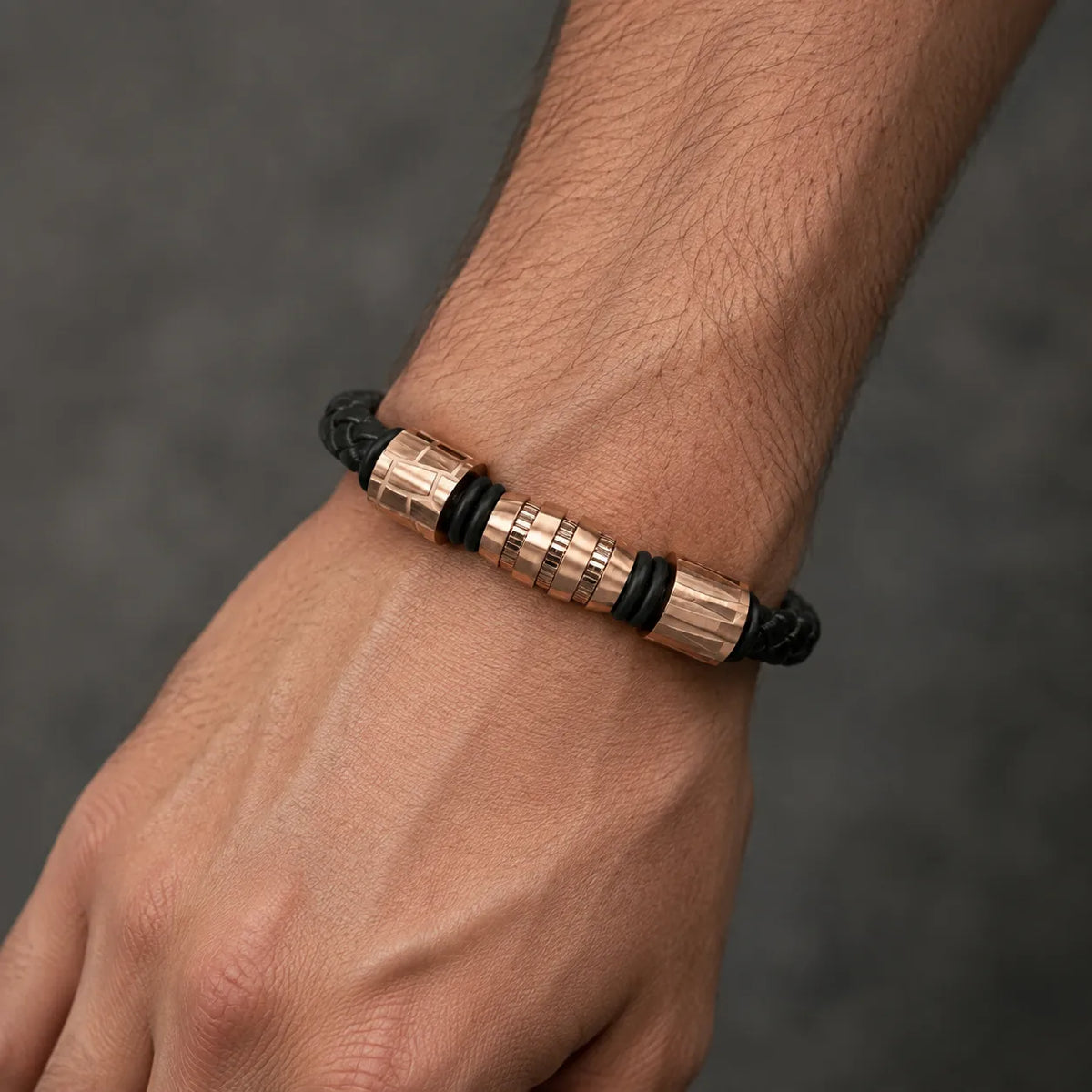 Shop a 6-piece textured braided bracelet set. Mix and match nautical anchor and hook styles in gold and silver tones for versatile wholesale accessories.
