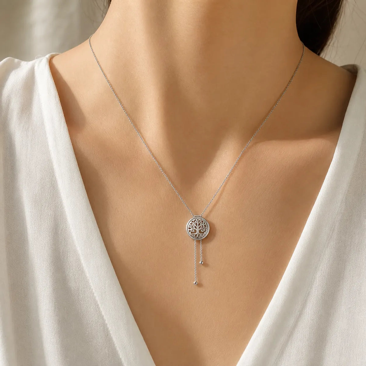 A 5Pcs silver-tone medallion necklace set with unique openwork round pendants and delicate dangle chain details. Wear separately or layer your favorite styles.