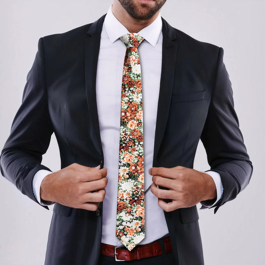 Business man in a suit wearing a HAWSON orange floral tie