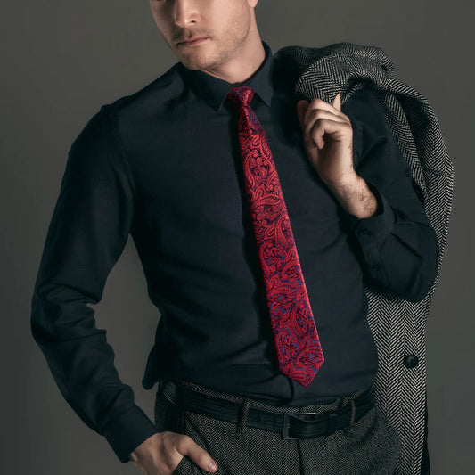 Businessman wearing HAWSON red paisley tie with a suit, retro office fashion example