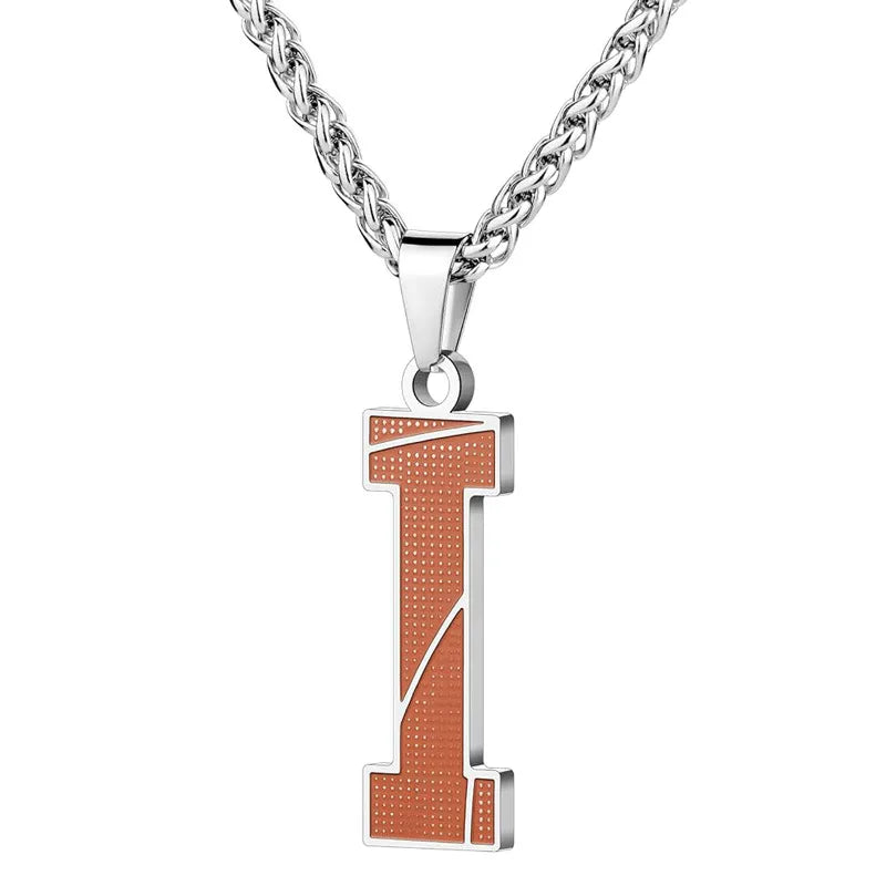 A curated collection of basketball-textured initial letter necklaces designed for wholesale buyers. Featuring a detailed basketball-grain finish on a stainless steel pendant and matching chain. 