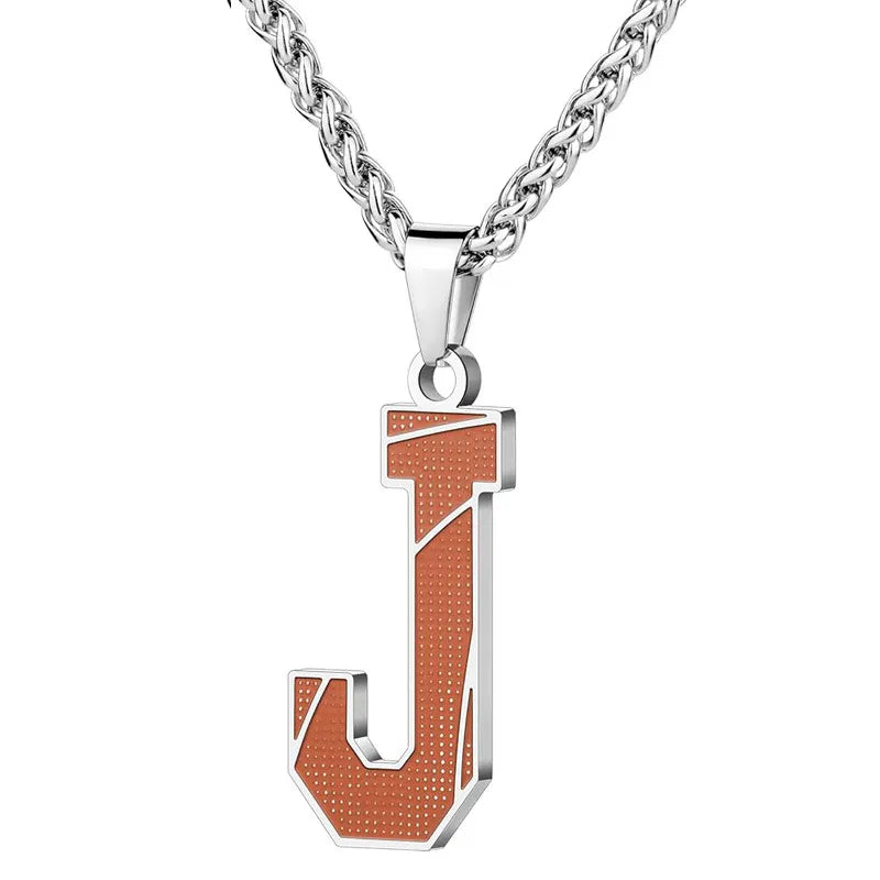 A curated collection of basketball-textured initial letter necklaces designed for wholesale buyers. Featuring a detailed basketball-grain finish on a stainless steel pendant and matching chain. 