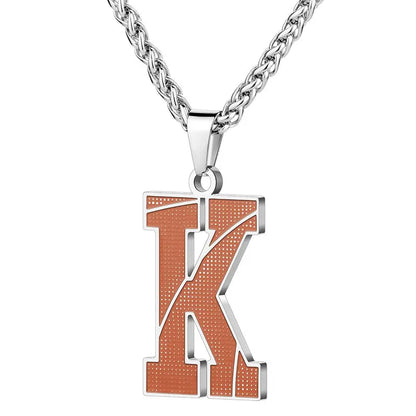 A curated collection of basketball-textured initial letter necklaces designed for wholesale buyers. Featuring a detailed basketball-grain finish on a stainless steel pendant and matching chain. 