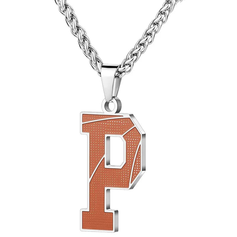 A curated collection of basketball-textured initial letter necklaces designed for wholesale buyers. Featuring a detailed basketball-grain finish on a stainless steel pendant and matching chain.