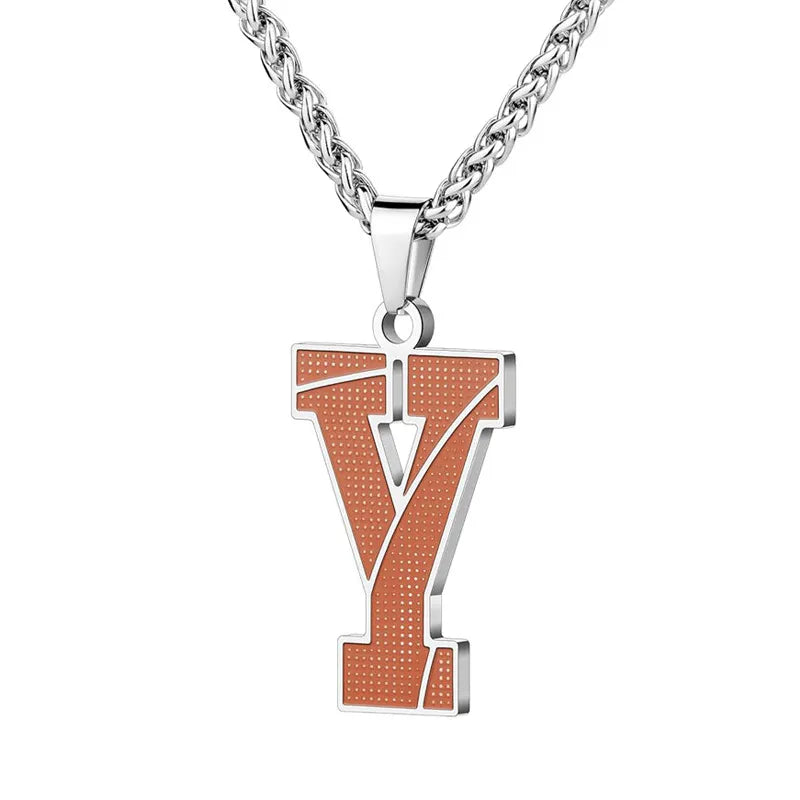 A curated collection of basketball-textured initial letter necklaces designed for wholesale buyers. Featuring a detailed basketball-grain finish on a stainless steel pendant and matching chain.