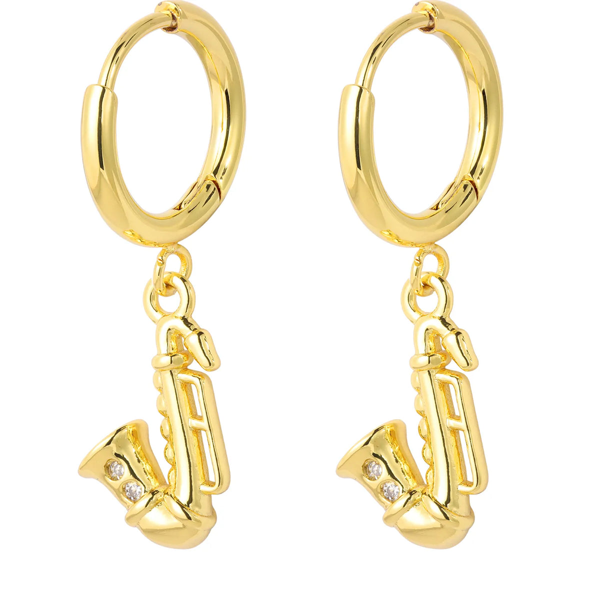 A curated collection of gold-tone dangling earrings featuring various charming motifs, including shells, fruits, animals, and sea creatures. Perfect for adding a playful, elegant touch to any outfit. A ready-to-sell bestseller for gift shops and fashion retailers.