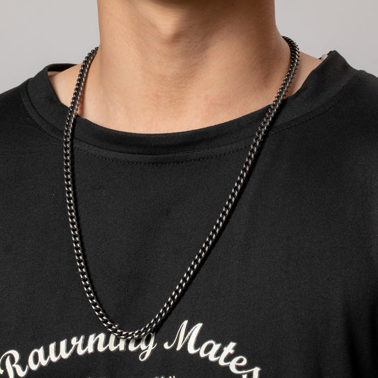 Male model wears black Curb Chain necklace by HAWSON.