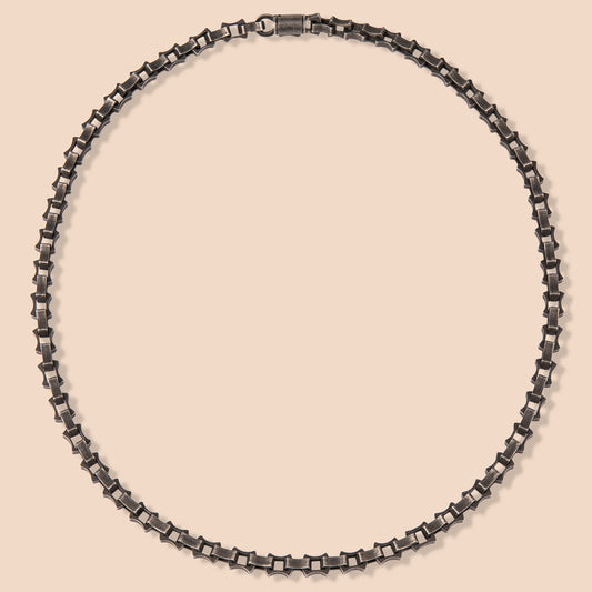 HAWSON Gothic box chain necklace showcasing thick 1mm stainless steel links with dark oxidized finish for men's alternative fashio