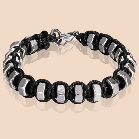 HAWSON's punk nuts braided leather bracelet featuring stainless steel hardware for edgy industrial style