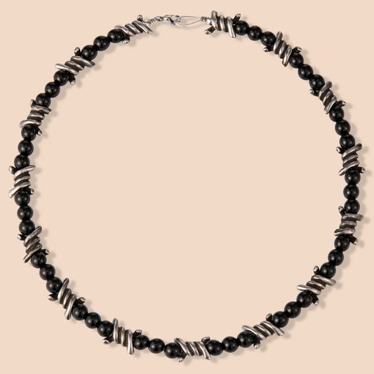HAWSON gothic bike chain necklace with barbed wire accents and black stones, blending industrial edge with dark elegance for daily wear