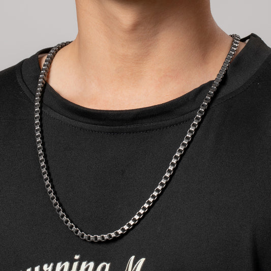 Male model wearing HAWSON’s Antique Rock Box Chain Necklace 