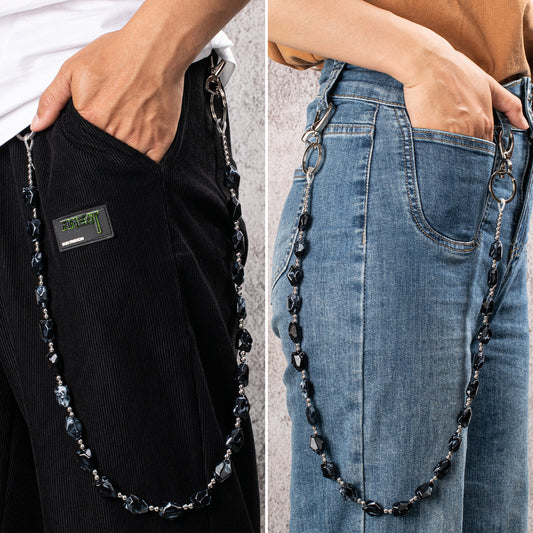Model wearing HAWSON beaded wallet chain on denim pants